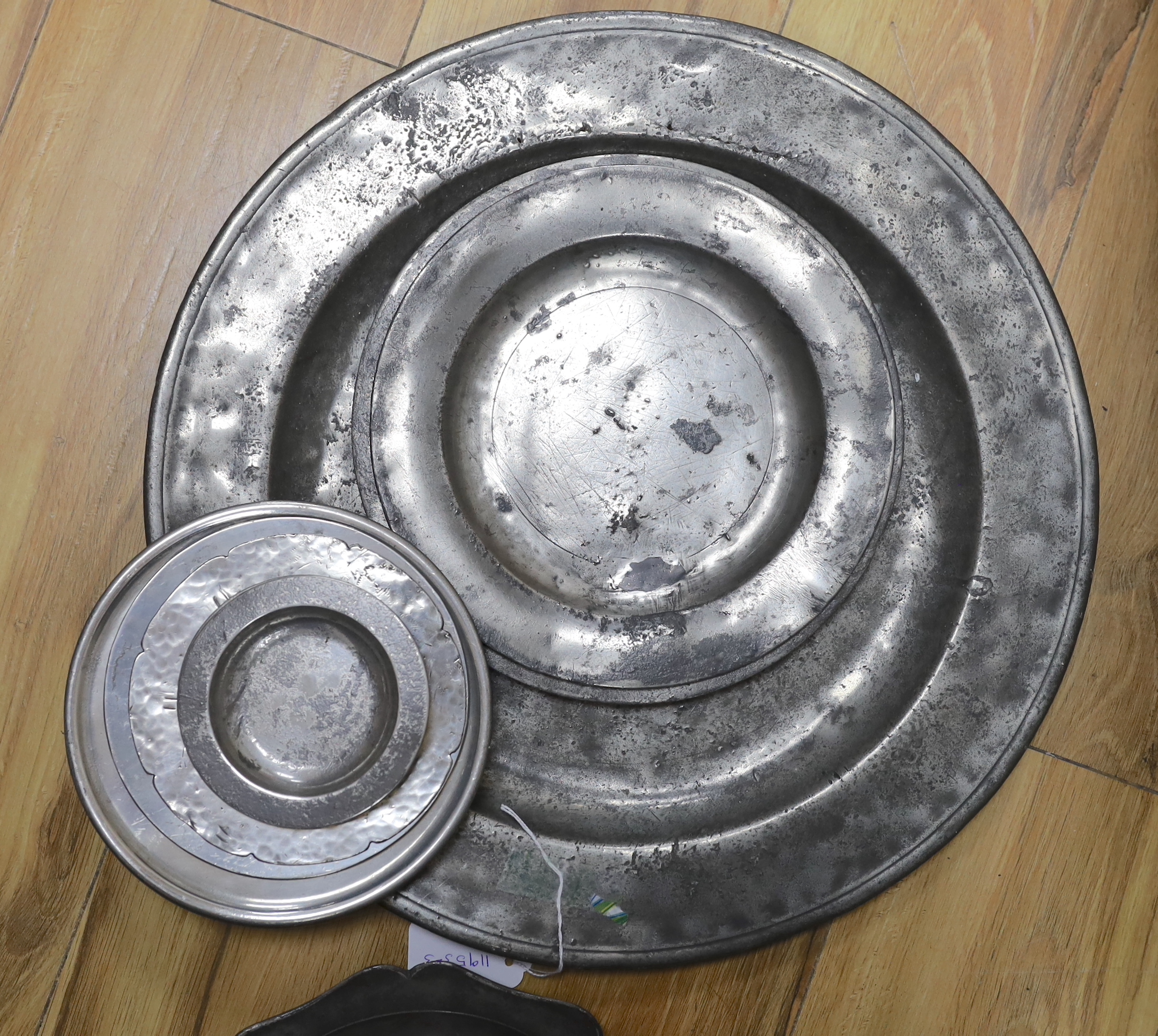 A collection of 18th century and later pewter chargers/plates